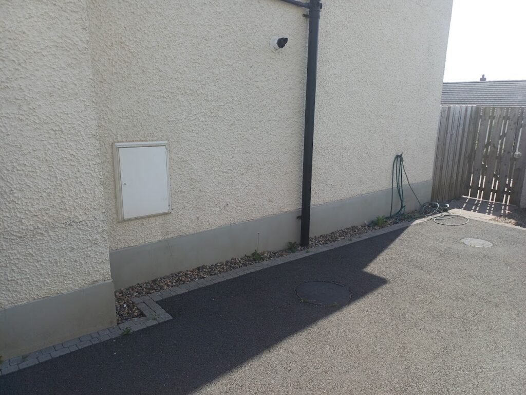 Driveway after household rubbish was removed